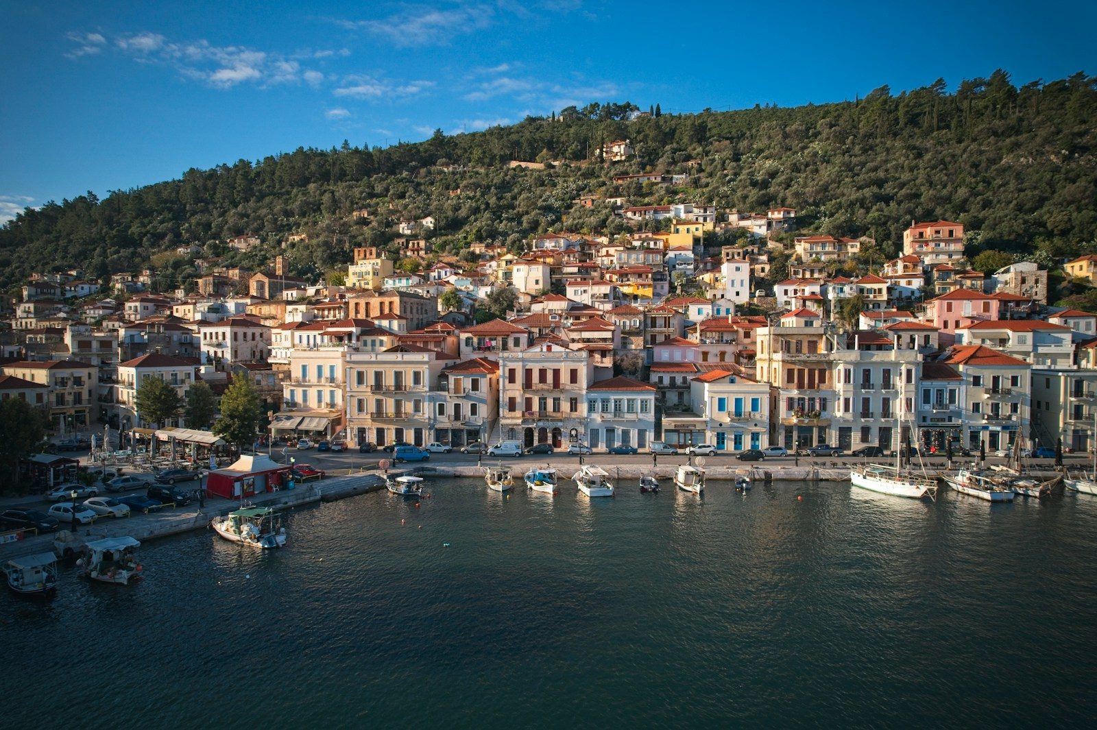 a group of boats floating on top of a body of water