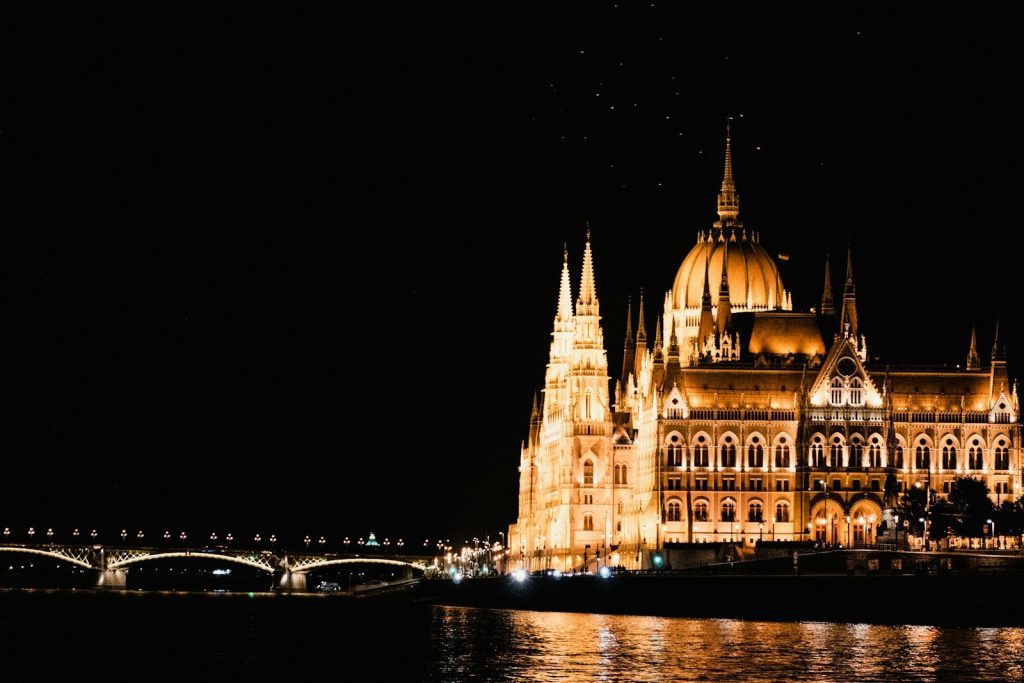 a large building with a domed roof at night