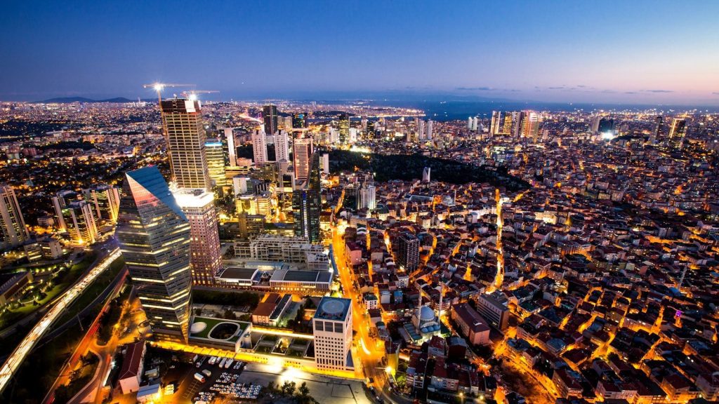 an aerial view of a city at night
