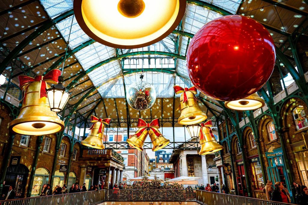 Christmas decorations hanging in a market hall